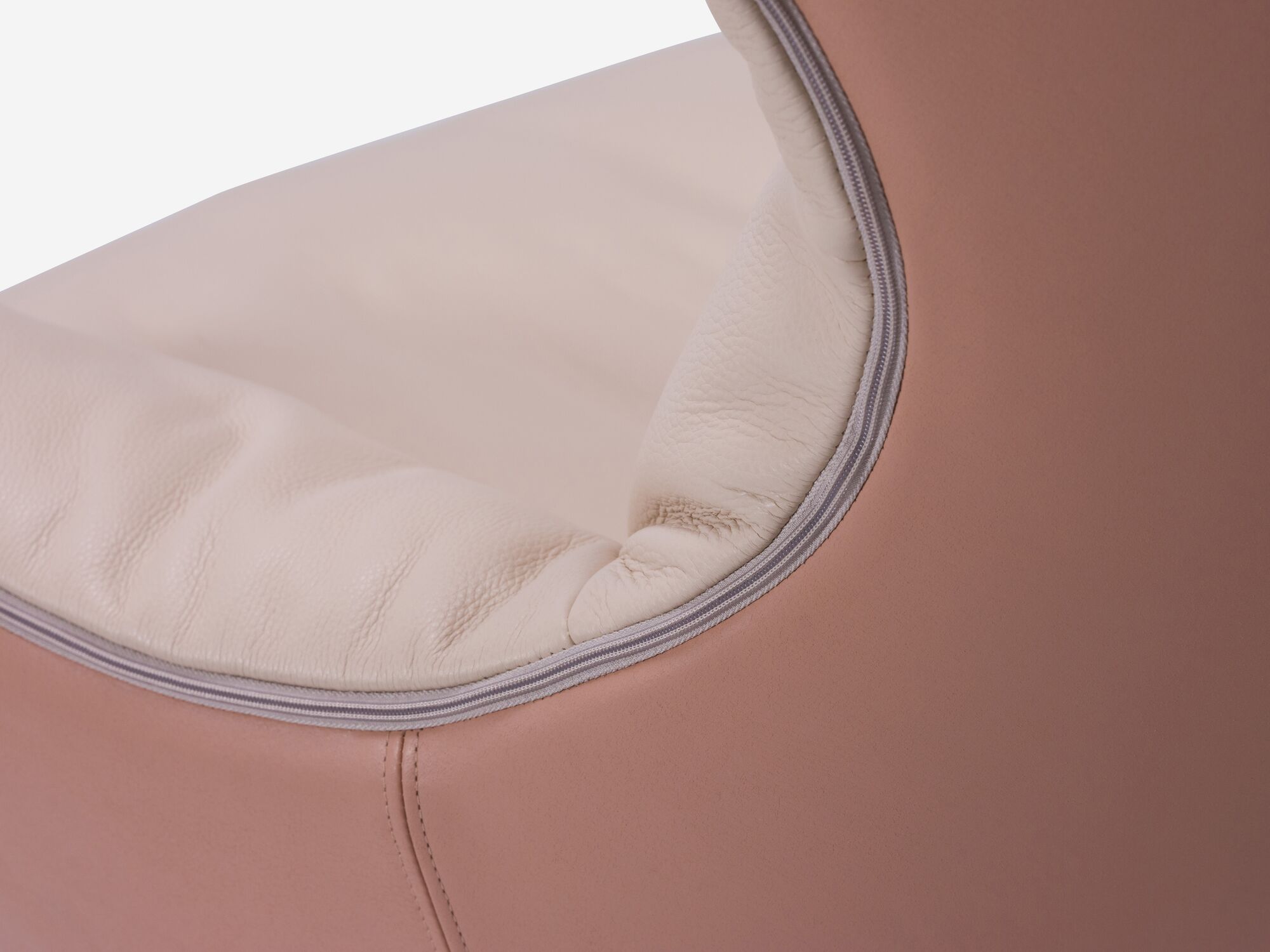 Pink custom upholstered swivel chair detail view